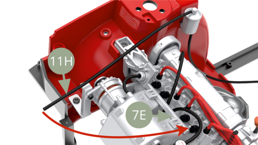 Fit 11H Fuel feed pipe to connector peg on 7E Fuel injection feed rail.