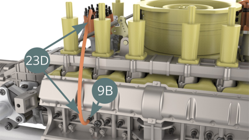 Brancher le premier fil 23D sur la bougie d’allumage 9B (illustration ci-dessous) et sur le connecteur 23C (illustration ci-dessous). Tourner la tête d’allumeur 23B (flèche bleue) afin qu’elle soit positionnée comme sur l’illustration ci-dessous.