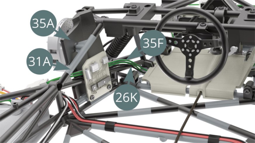 Comprueba la correcta posición de los cables 35F (verde-blanco) y 26K (negro) después de montar el Guardabarros izquierdo (35A). 