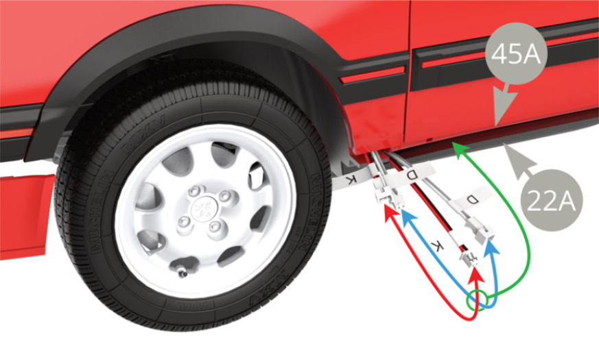 Connect the D (grey - white) and K (black - red) cables together near the left front wheel. Then slide them into the slot located on the bottom side, between the body floor, passenger compartment 45A and chassis panel 22A.