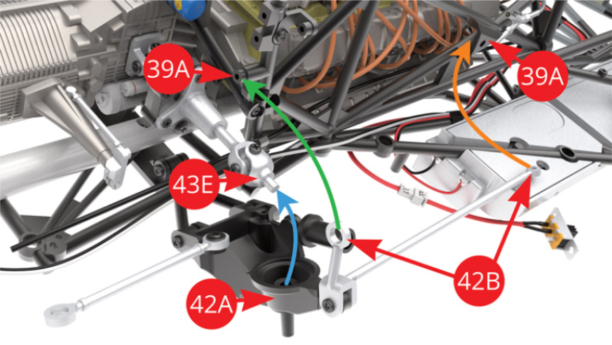 Faire basculer vers le haut le pivot arrière droit 42A afin d’y engager l’extrémité du demi-arbre 43E (flèche bleue).Dans le même temps, aligner les extrémités du bras longitudinal 42B avec les deux points d’attache du châssis latéral droit 39A indiqués par les flèches orange et verte.
