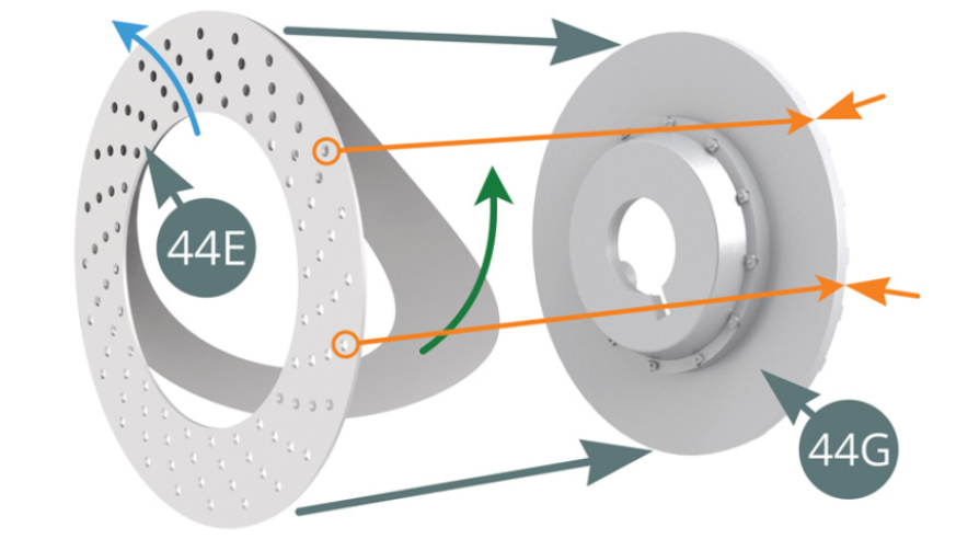 Retira el papel protector (flecha verde) de la superficie del disco de freno (44E) - observa la dirección de los orificios de ventilación, flecha azul - y aplica el adhesivo sobre el Semi disco de freno exterior (44G). Asegúrate de que los orificios exteriores se alinean con las nervaduras del Semidisco (44G) - flechas naranjas.