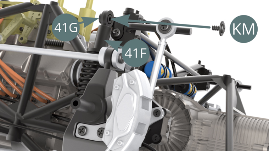 Positionner la tête du piston de suspension 41F sur l’extrémité du support 41G et la fixer avec une vis KM.