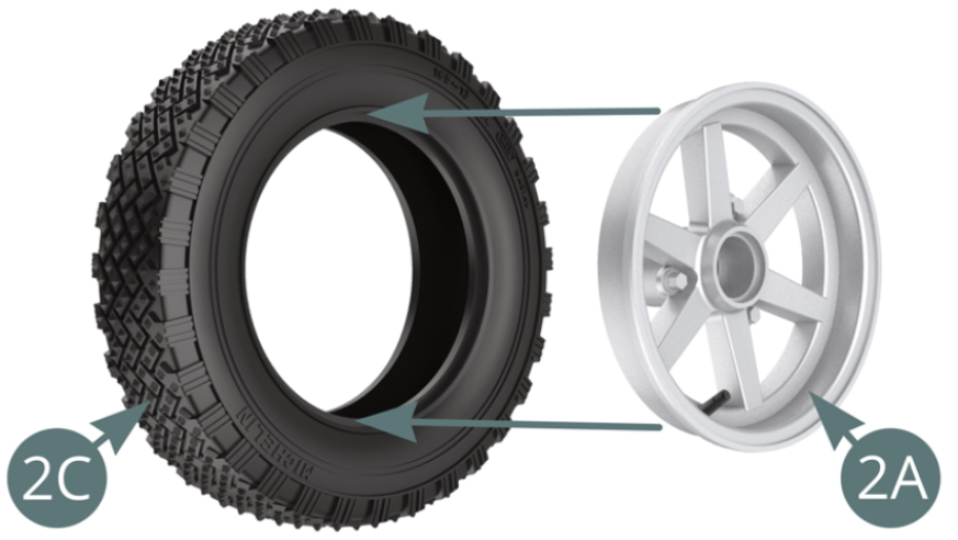 Position the outer wheel rim (2A) into the tyre (2C).