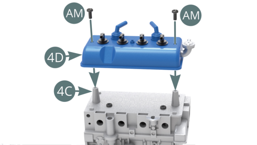 Place the cylinder head (4D) on top of the engine block (4C) and secure with two AM screws.