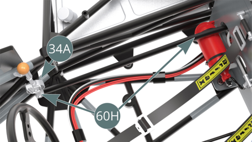 Posizionare la leva del cambio (60H) sul lato destro del telaio (34A) in cabina.