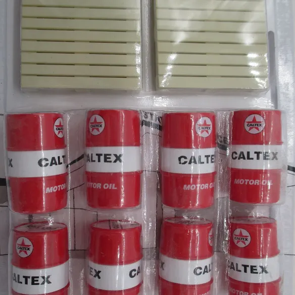 Conjunto de 2 paletes + 8 tambores de óleo de motor marca CALTEX