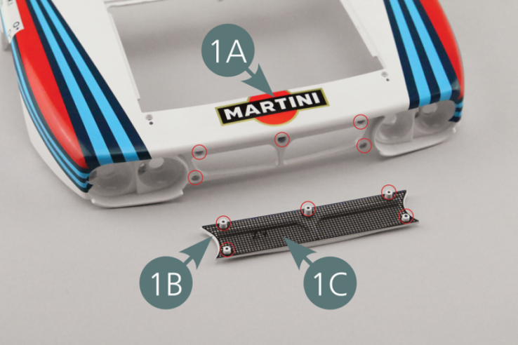 Attach the grille (1B) to the front body (1A) using five KP screws.