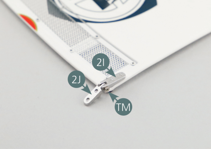 Clip the lock rings (2F) onto the fasteners (2E). Position the hinges (2J) into the hinges (2I) and secure with a TM screw.