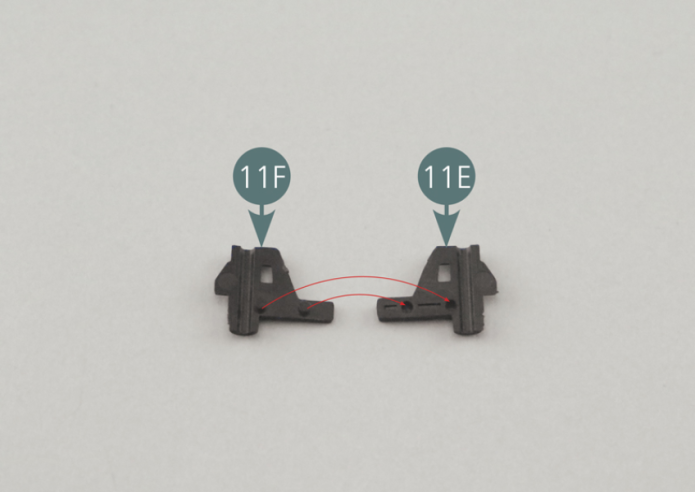 Position the male jack lever (11F) on the female jack lever (11E). Then insert the jack rod (11D) into the lever, as shown in the illustration.