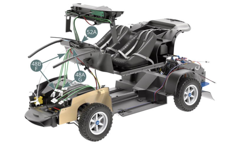 Encaminhar os cabos F e G (48B&48A) através do orifício oval no chão do compartimento dos passageiros (52A). 