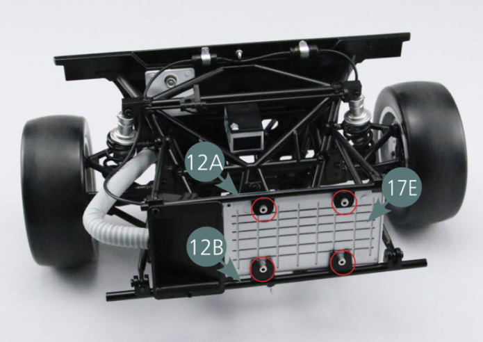 Position the rear part of the radiator (17E) between the upper (12A) and lower (12B) bar. Connect the front end of the pipes A (17F) and B (17G) to the rear part of the radiator (17E) as shown in the illustration. 