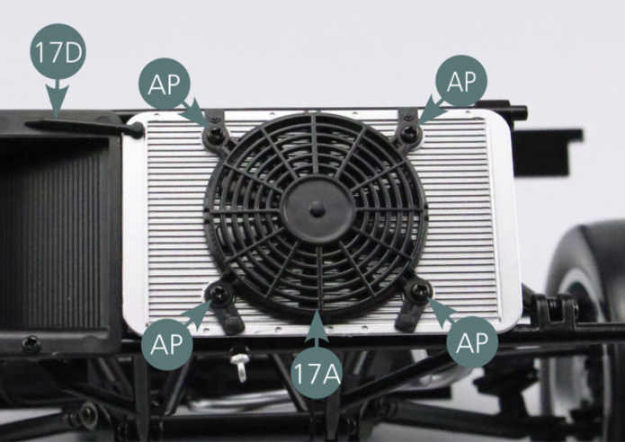 Position the fan grille (17A) on the radiator (17C) and secure with four AP screws. Position the overflow pipe (17D) at the top left of the radiator (17C) - as shown in the illustration.