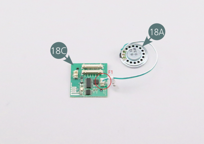 Connect the speaker cable (18A) to the PCB (18C) - socket F1. Connect the cable from the battery compartment (18B) to the PCB (18C) - socket A1. Connect the headlight cable plug (18D) to the PCB (18C) - socket C2.