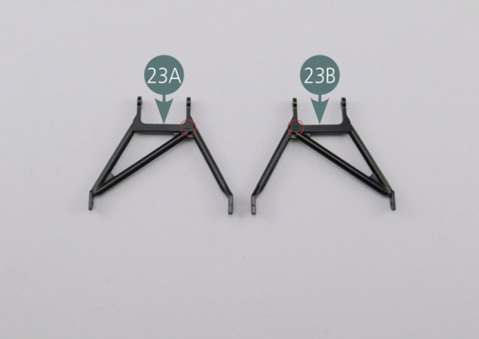 The left lower suspension arm (23A) is identified by letter “L”, while the right lower suspension arm (23B) is identified by “R”. Position the lower left suspension arm (23A) on the supports (23C&22B), then secure with two WM screws. Position the right lower suspension arm (23B) on the supports (23C&22C), and  secure with two WM screws.