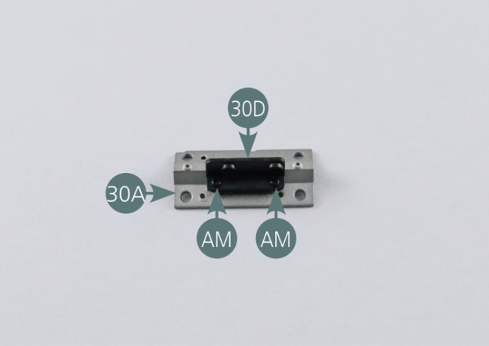 Position the connection part (30D) on the engine cylinder head (30A). Secure the connection part (30D) with two AM screws.