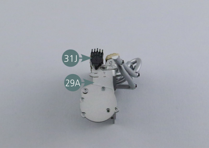 Position the ignition distributor (31J) on the right engine block (29A) and secure with an AP screw. 