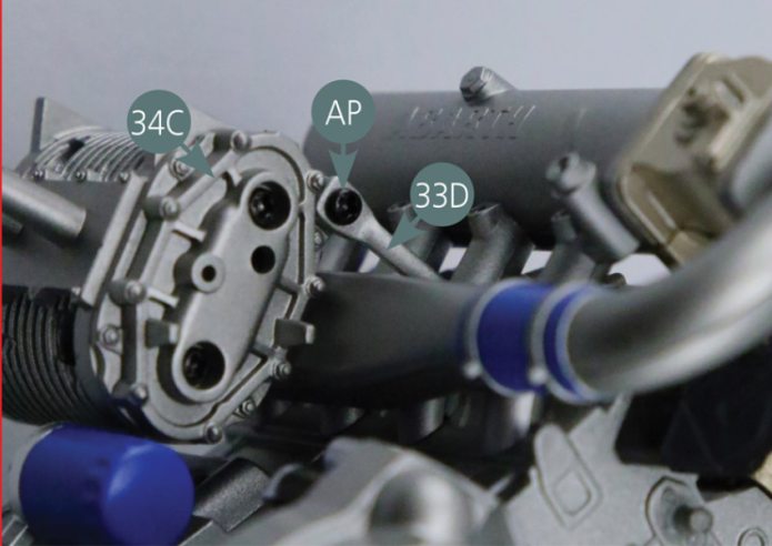 Fixer le second support de turbo 33D sur l’avant du turbocompresseur 34C avec une vis AP.