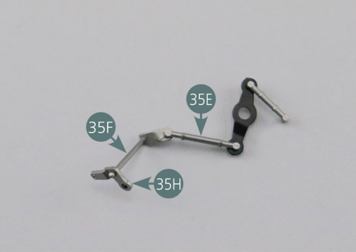 Place the accelerator rod #3 (35F) onto the free end of the accelerator rod #2 (35E), then position the lower accelerator lever (35H) onto the accelerator rod #3 (35F). Make sure each part is positioned correctly.