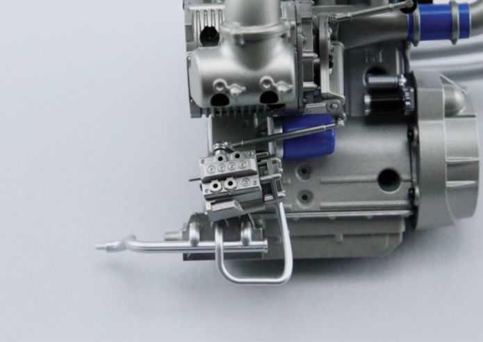 Position the injection pump near the oil filter, then connect the front accelerator lever (35I) to the widest shaft of the injection pump dispenser (37L).