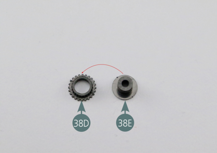 Place the pulley #4(38D) on the pulley #1 (38E) as indicated in the picture. Position the pulley assembly (38D&38E) on the pulley #11 (38C) and secure them with a UM screw.