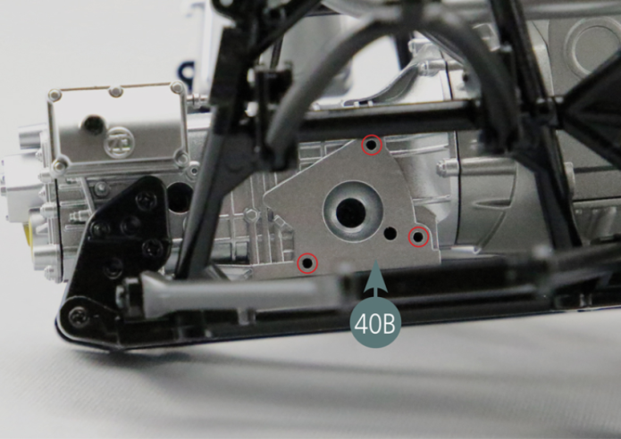 Position the right rear driveshaft bracket (42B) onto the right gearbox (40B) and secure with three AM screws.