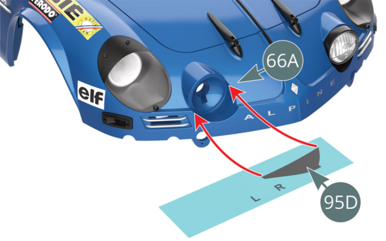 First, cut out the decal for the right long-range headlamp (95D). Soak it in water for 30 seconds, then place it in the recess provided for the right long-range headlamp on the body (66A). Remove excess water with a cotton pad and leave to dry for 5 minutes.