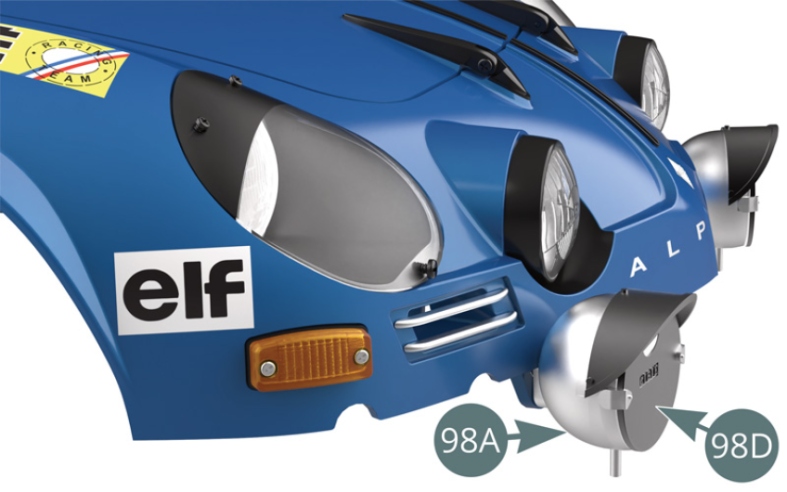 The cover with beam guide (98D) is attached to the right fog light housing (98A).