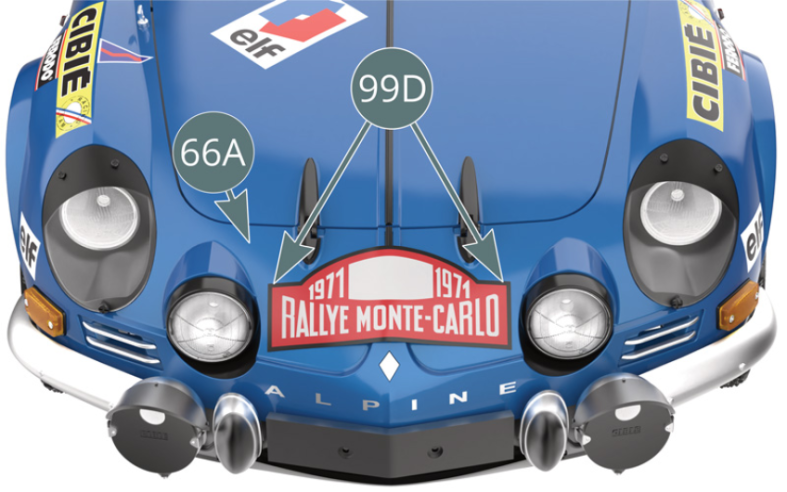 Rimuovere il foglio di supporto (solo un lato) dall’adesivo a doppia faccia (99F) e incollarlo sul retro della piastra rally anteriore (99D). Piegare leggermente la piastra rally anteriore (99D) per adattarla alla curvatura della parte anteriore della carrozzeria (66A). Rimuovere quindi il foglio di supporto dall'altro lato del adesivo e fissare la piastra rally anteriore alla carrozzeria (66A).