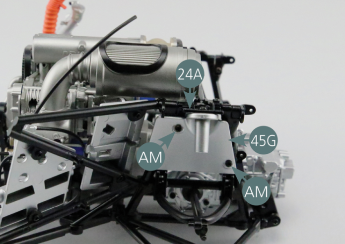 Position the left rear suspension panel (45G) on the left rear link arm (24A) and secure it with two AM screws.