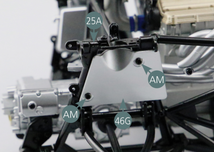 Position the right rear suspension panel (46G) on the right rear link arm (25A) and secure it with two AM screws.