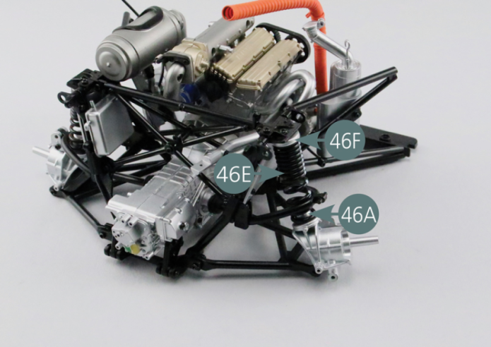 Position the rear suspension spring (46E) and the right rear hub (46A) as shown in the photo.