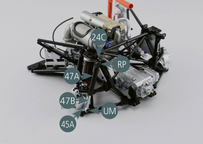 Position the second shock absorber on the engine cradle. Fix the upper end of the shock absorber cylinder (47A) to the link arm support #2 (24C) using a RP screw.Then secure the lower end of the shock absorber piston (47B) to the left rear hub (45A) using a UM screw.