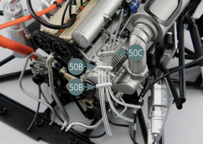 Cut four sections of 60mm, 75mm, 85mm and 95mm long from the fuel hose (50A). Connect one end of each section to an injector (50D) as shown in the photo. Position the attachments (50B&50C) as indicated.