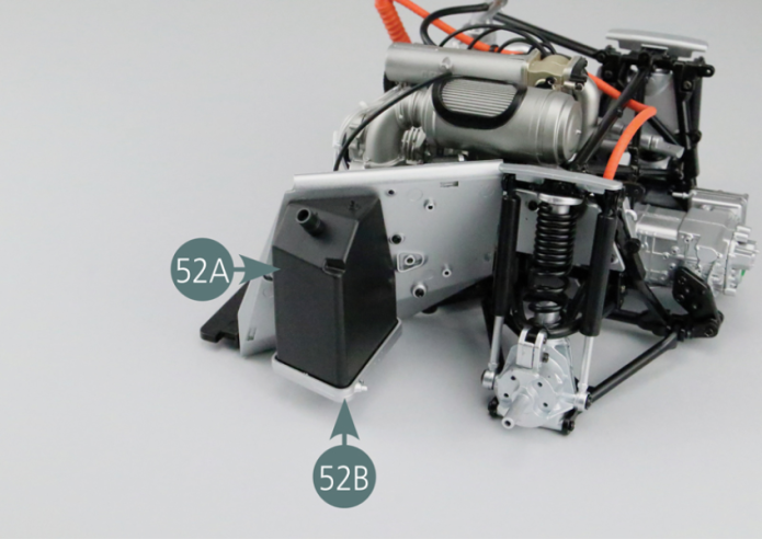 Place the left fuel tank (52A) on the support (52B) and secure from below with three AP screws.