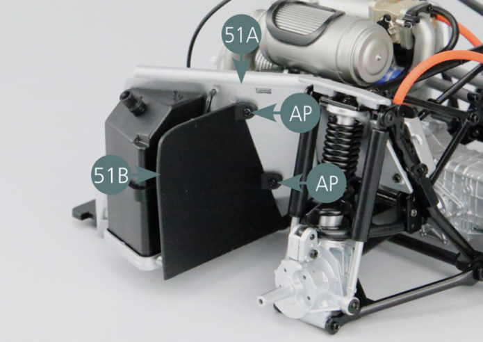 Position the left mudguard (51B) on the left bulkhead (51A) and secure with two AP screws.