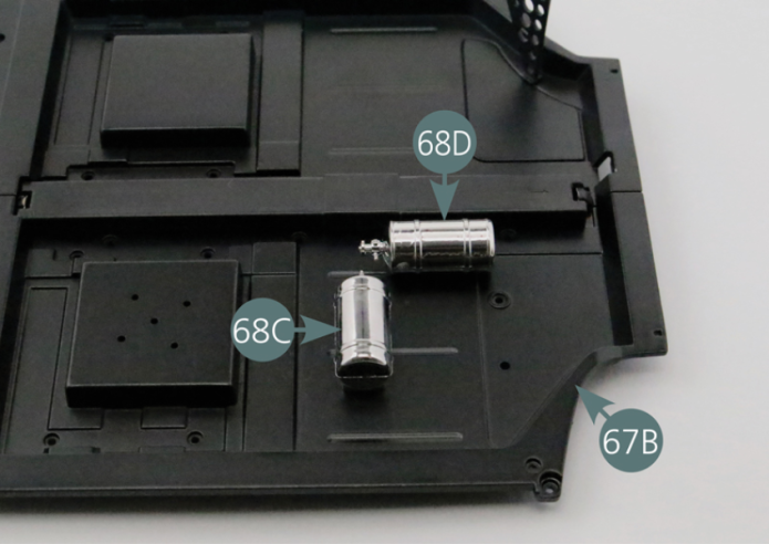 Position the two fire extinguishers (68C&68D) on the right floor panel (67B) as per picture and secure from below with four AP screws.