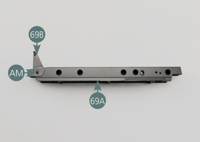 Place the accelerator support (69B) on the central tunnel (69A) and secure with an AM screw.