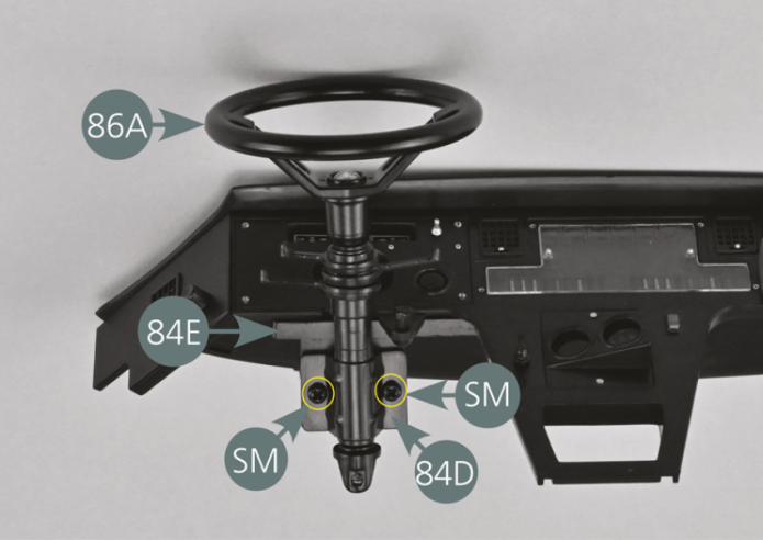 Position the steering column assembly on the lower dashboard panel (84E) and secure with two SM screws.