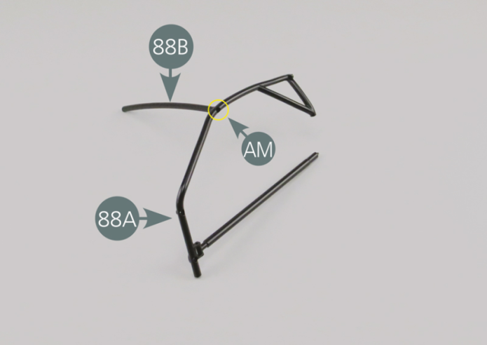 Place the end of the upper bar of the roll cage (88B) in the slot provided on the left roll cage (88A) and secure it with an AM screw. Position the dashboard panel (80A) and the support bar (87A) on the left safety roll cage (88A) and secure with an AM screw.