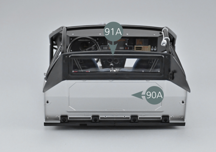 Position the rear panel (91A) on the rear bulkhead (90A). Flip the assembly over, align the openings and secure the rear panel (91A) with three AM screws.