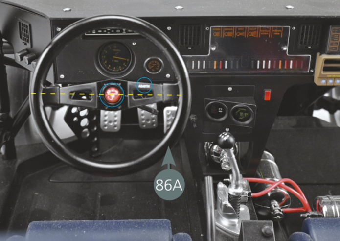 Turn the steering wheel (86A) so that its two arms are perfectly horizontal (yellow line) and check the correct positioning of the ABARTH name and logo (blue circles), in order to keep the front wheels straight. Place the new intermediate shaft (86H) on the steering column (86F) and secure it with an ADM screw.