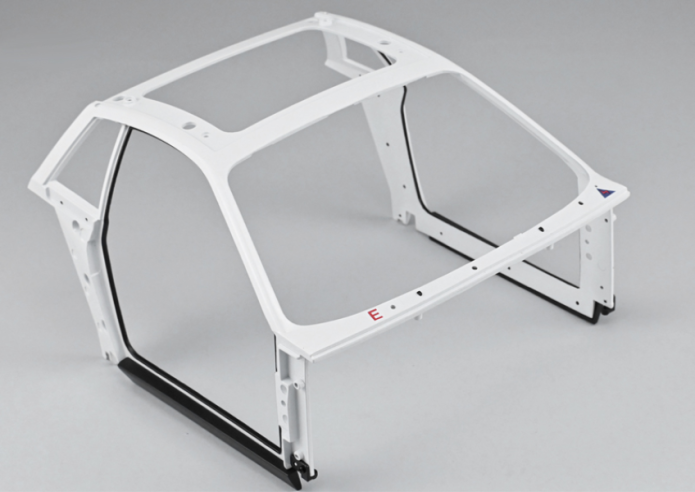  Then position the right rocker panel (94D) into the three openings located on the lower right part of the body (93A) (below the door opening).