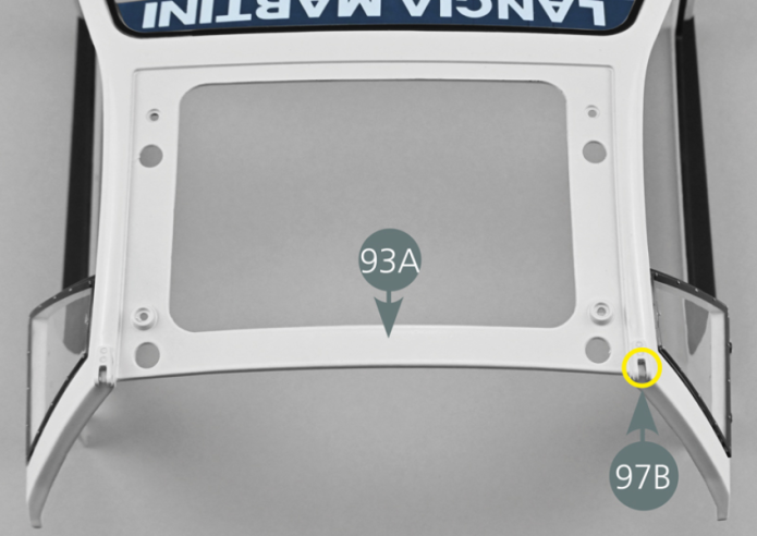 Position the right rear upper hinge (97B) in the opening located on the left upper exterior of the central body (93A) (yellow circle). Keeping it in place, then secure from the inside of the body with an SM screw as shown in the photo.