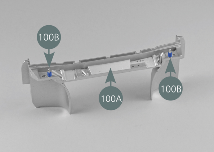 Place the second support (100B) into the opening located above the front compartment bulkhead (100A), then secure it from the rear with an AM screw.