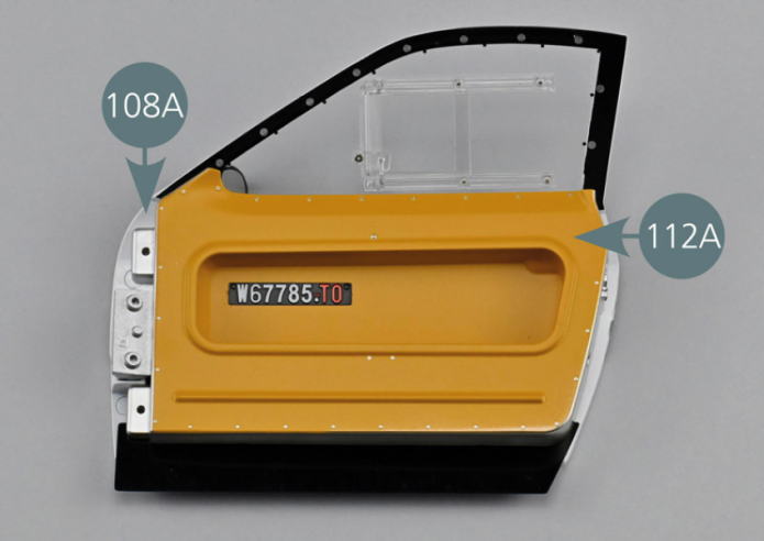 Position panel #B (112A) on the inside of the right door (108A) as shown, then secure it with two AGM screws into the two openings indicated by a red circle.