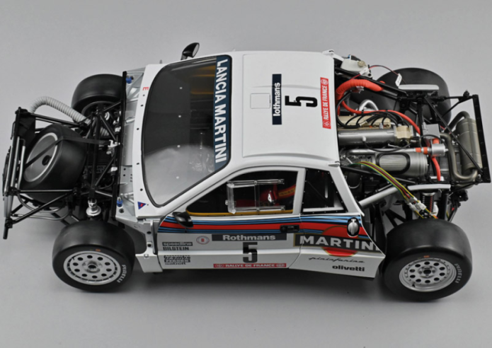 Route the air duct (37J) under the right rear upper reinforcement bar (92B) of the frame as shown.