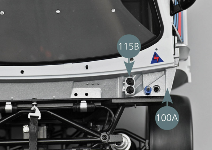 Place the double expansion tank (115B) on the lugs provided on the front passenger compartment bulkhead (100A).