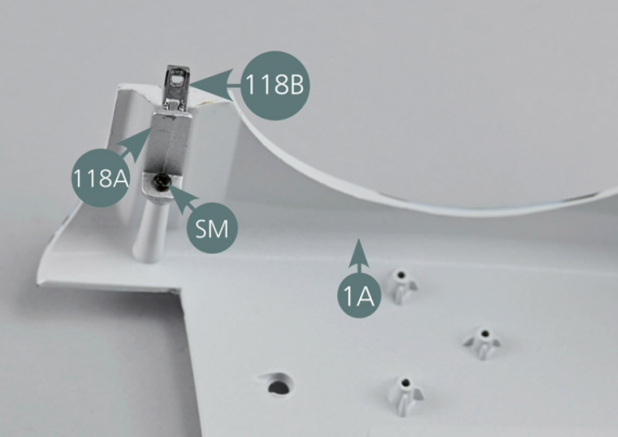 Place the front bonnet (1A) face down on the worktop.Position the support (118A) and fastener (118B) assemblies (facing outwards) on either side of the bonnet (1A) as indicated by the yellow dotted circles, then secure them with an SM screw.