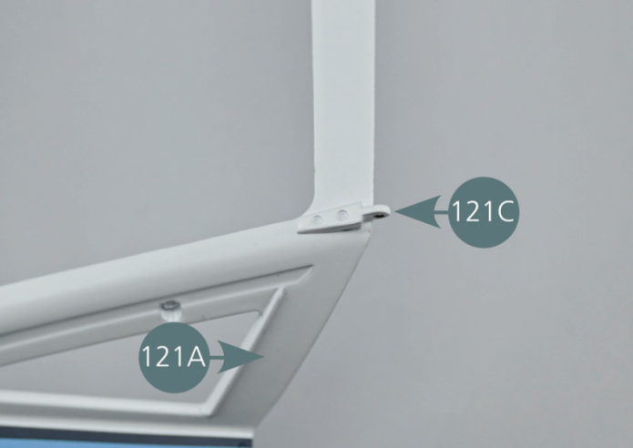 Position the right-hand hinge (121C) in the right top recess of the rear bonnet (121A). Turn the assembly over and secure the hinge with an AM screw.